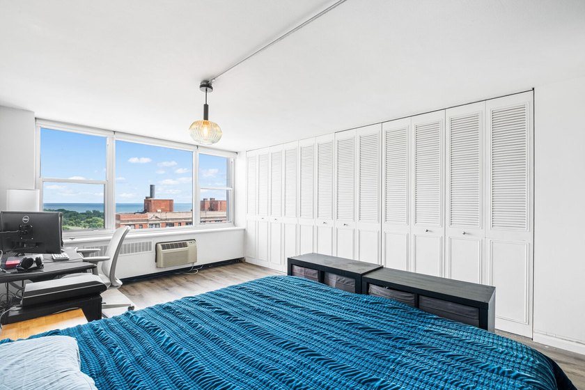 Two bedrooms. Lake view. Endless possibilities. Perched on the - photo 8