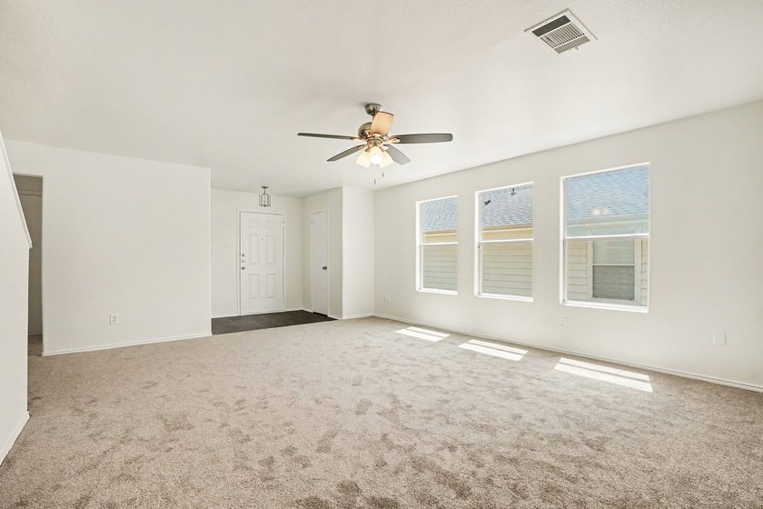 Welcome to this impressive 5-bedroom, 3.5-bathroom two-story - photo 4