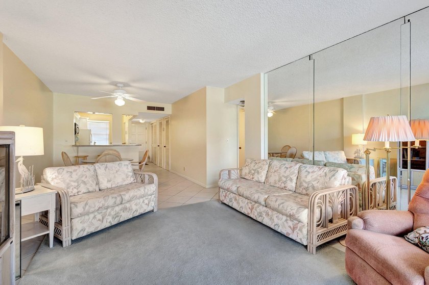 VIEWS! VIEWS! VIEWS! NPB Condo with low HOA fees! Beautiful - photo 11