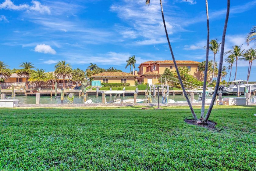 VIEWS! VIEWS! VIEWS! NPB Condo with low HOA fees! Beautiful - photo 18
