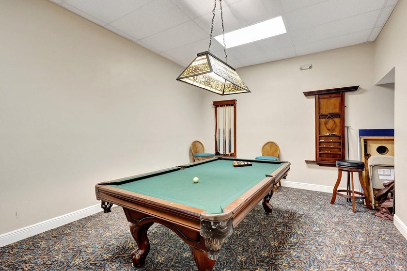 VIEWS! VIEWS! VIEWS! NPB Condo with low HOA fees! Beautiful - photo 27