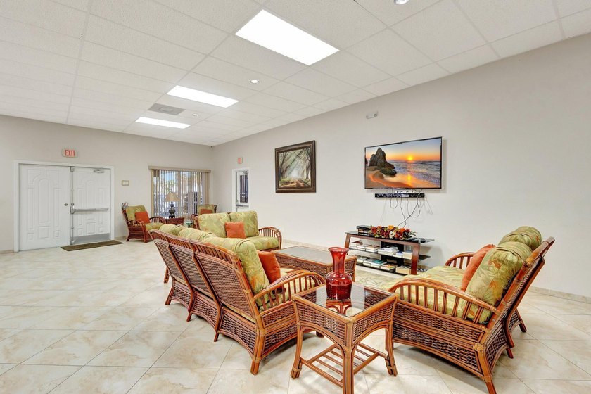 VIEWS! VIEWS! VIEWS! NPB Condo with low HOA fees! Beautiful - photo 30