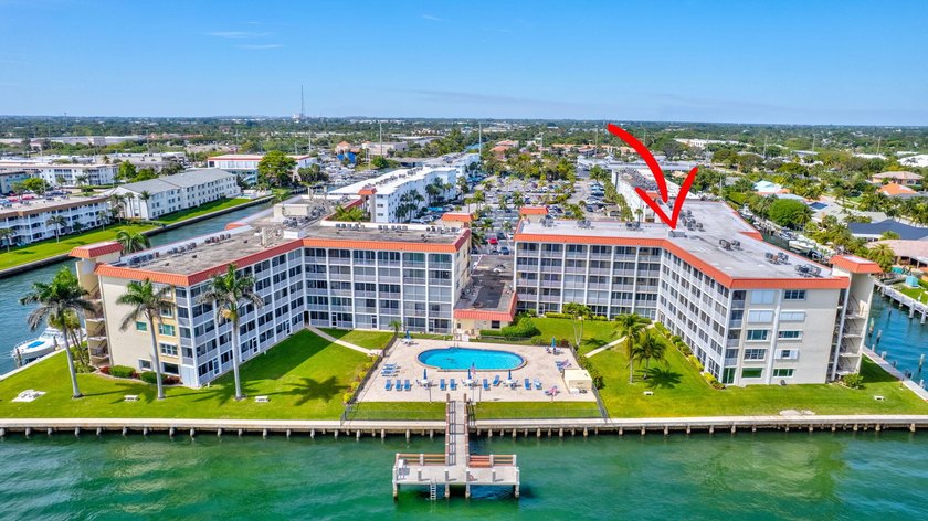 VIEWS! VIEWS! VIEWS! NPB Condo with low HOA fees! Beautiful - photo 32
