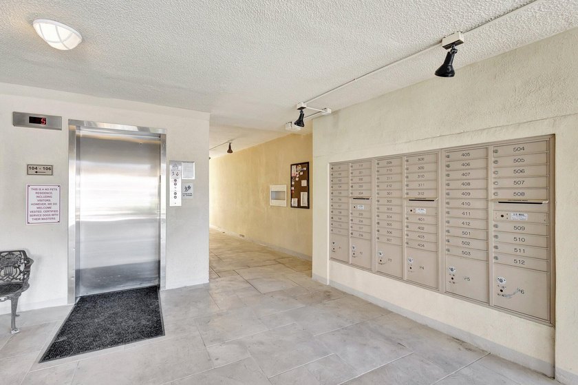 VIEWS! VIEWS! VIEWS! NPB Condo with low HOA fees! Beautiful - photo 35