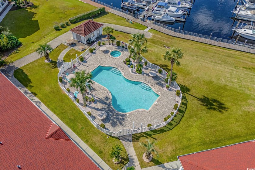 Located in desirable Harbourfront Villas, this fully furnished - photo 37