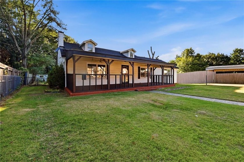 Dive in to your own private backyard oasis. Nestled in the - photo 2