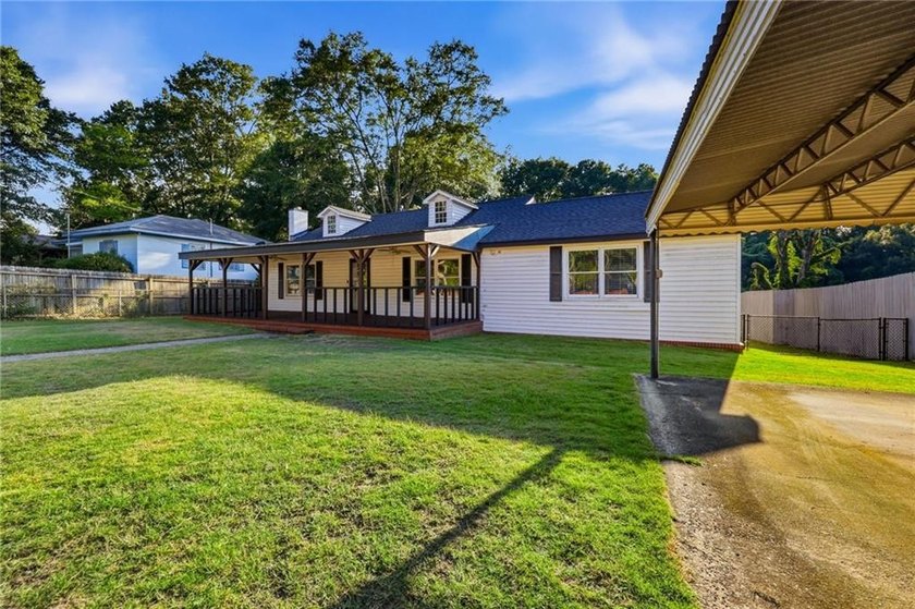 Dive in to your own private backyard oasis. Nestled in the - photo 3
