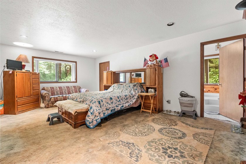 Redwood retreat! This 2,930 square foot home is situated on a - photo 22