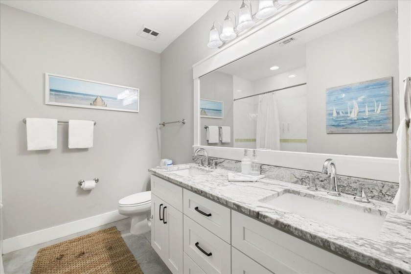 Escape to the perfect beach haven with this beautifully upgraded - photo 22