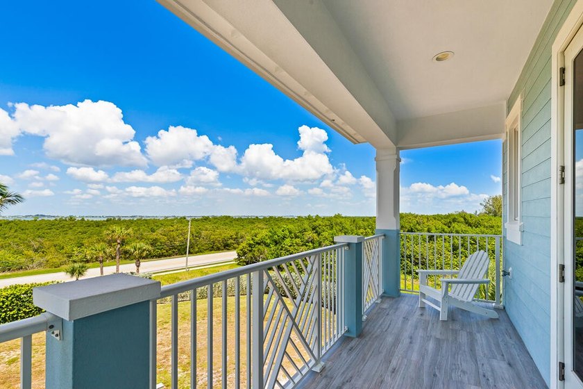 Welcome to Watersong's premier residence, set on the community's - photo 34