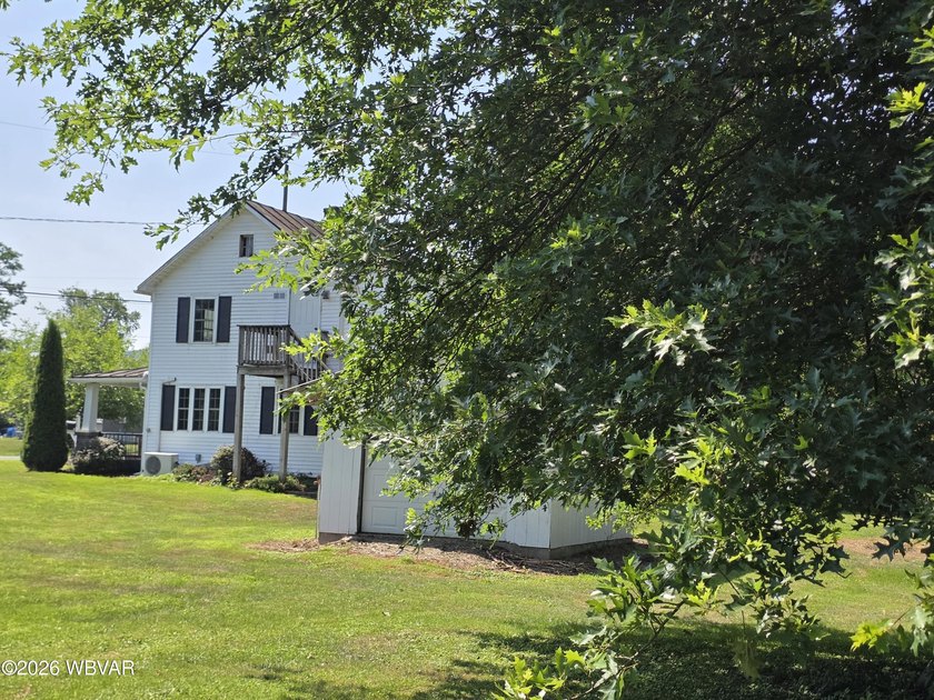 A lovely 2 acre parcel convenient to amenities but nice and - photo 7