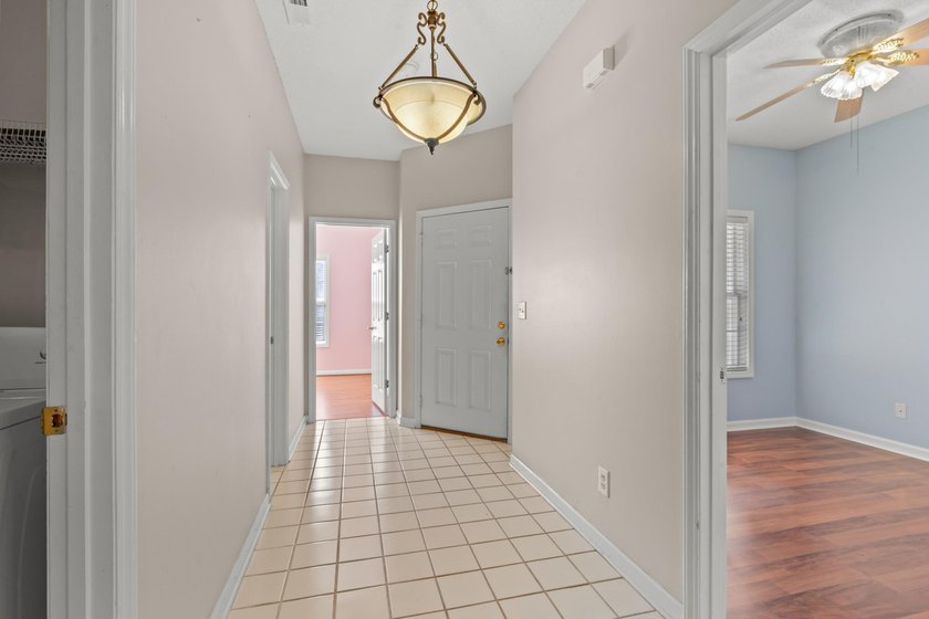 Welcome to Yacht Club at Lightkeepers Village! This spacious - photo 3