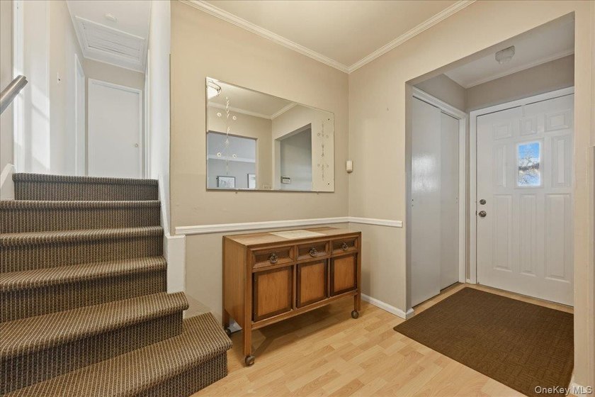 A charming expanded 3-bedroom, 2.5-bath split-level home located - photo 4
