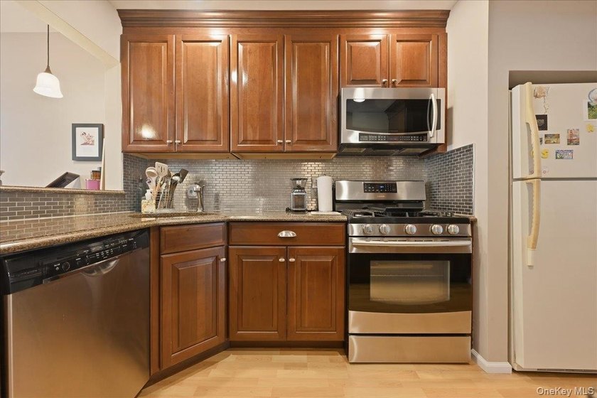 A charming expanded 3-bedroom, 2.5-bath split-level home located - photo 10
