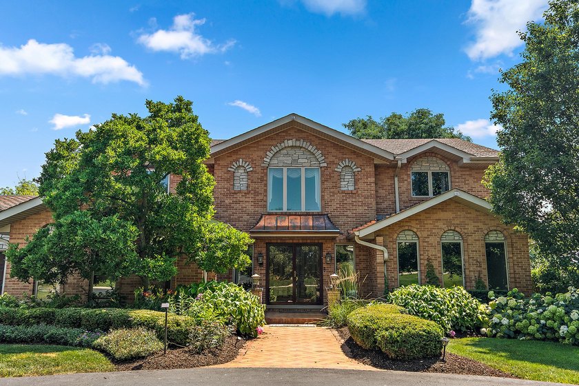 Nestled on a picturesque 1 acre lot in Equestrian Estates, one - photo 3