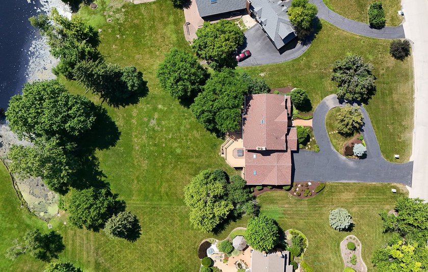 Nestled on a picturesque 1 acre lot in Equestrian Estates, one - photo 7