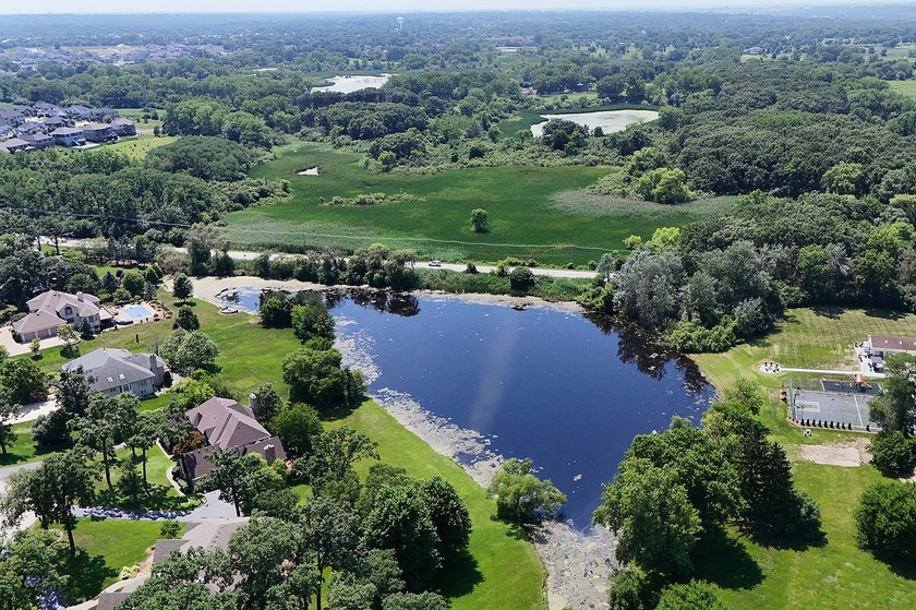 Nestled on a picturesque 1 acre lot in Equestrian Estates, one - photo 8