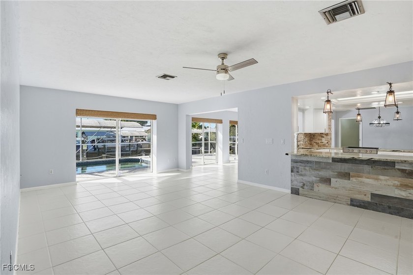 New Price!! Take a look at this Gulf-access pool home in the - photo 9