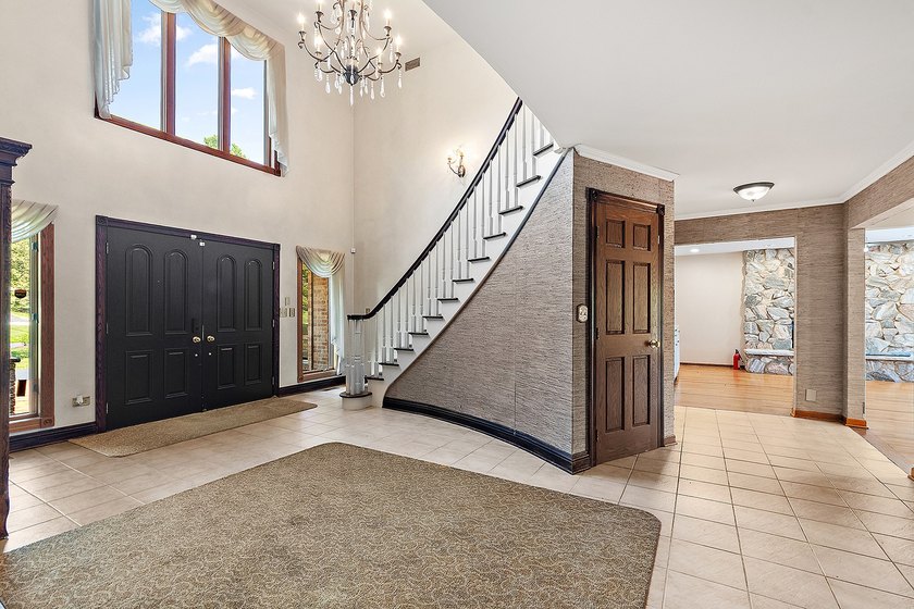 Nestled on a picturesque 1 acre lot in Equestrian Estates, one - photo 9