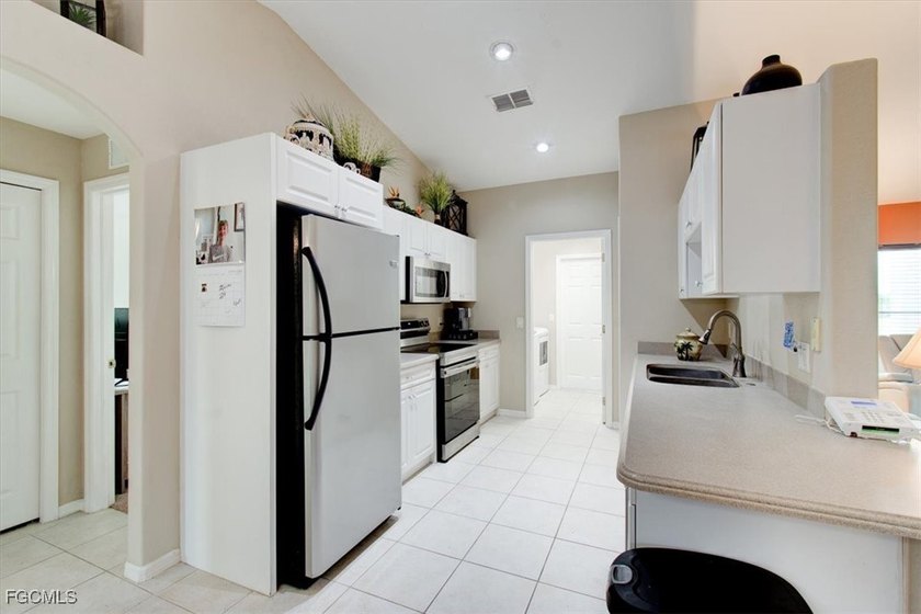 Nestled in the peaceful surroundings of North Cape Coral, this - photo 11