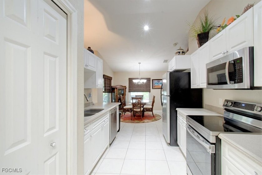Nestled in the peaceful surroundings of North Cape Coral, this - photo 12