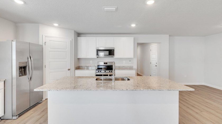 *Model home shown. Not actual home. Features shown may not be - photo 14