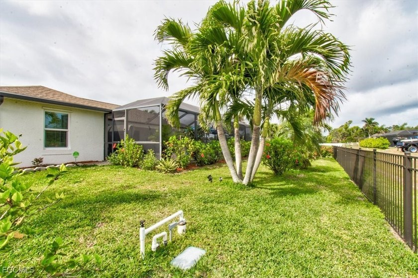 Nestled in the peaceful surroundings of North Cape Coral, this - photo 29