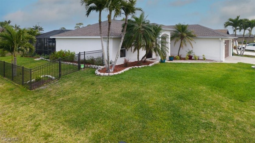 Nestled in the peaceful surroundings of North Cape Coral, this - photo 49