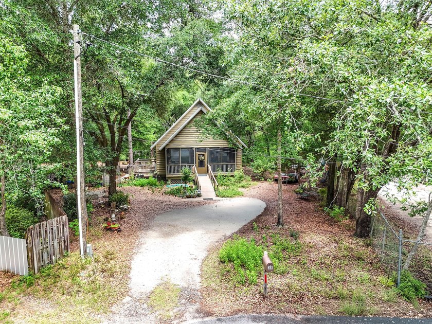 Florida cottage on .79 acres - totally renovated and nestled in - photo 2