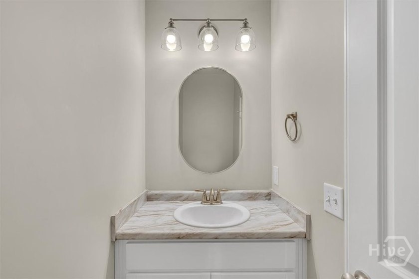 Newly constructed in 2024, this modern 3BR/2.5BA home offers an - photo 12