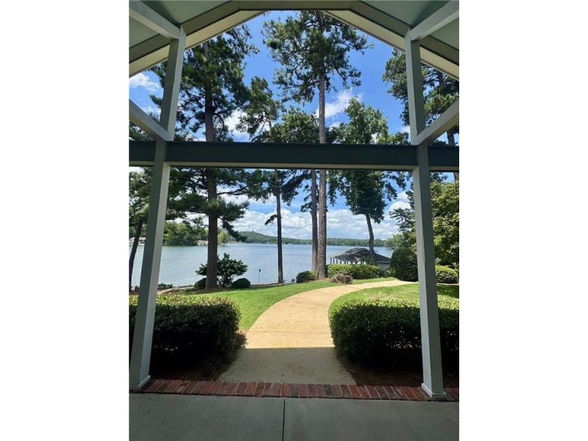 Experience elevated lakefront living on one of the most - photo 3