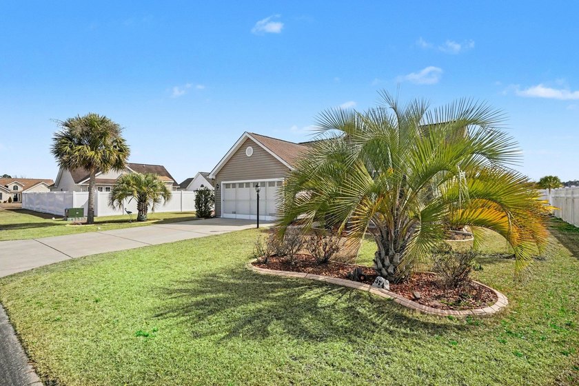 This beautifully maintained home in Highland Woods showcases - photo 3