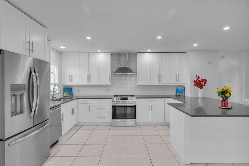 Are you looking for a canal-front home that could use your TLC? - photo 11