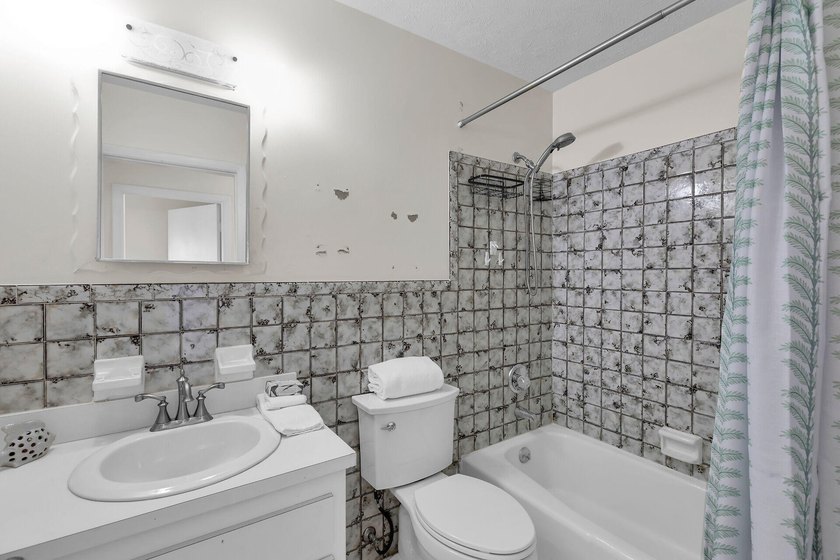 Are you looking for a canal-front home that could use your TLC? - photo 24