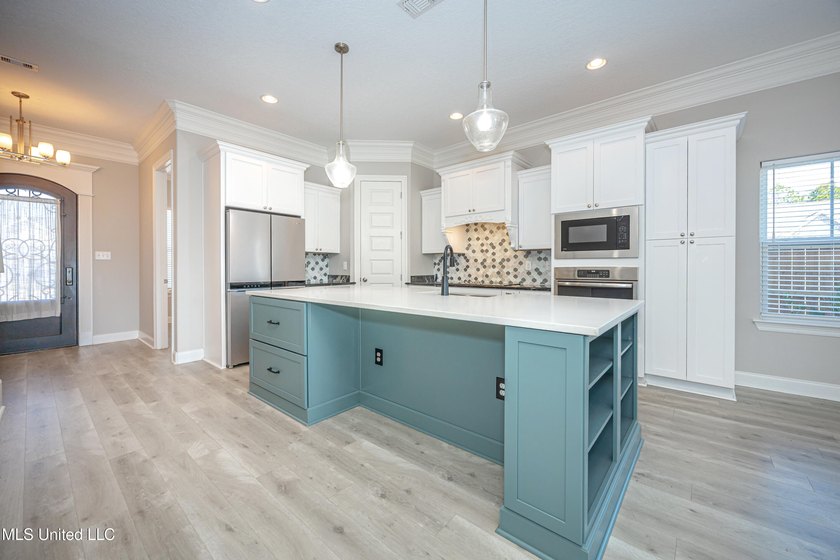 Welcome to 104 Westwind Court in the heart of Ocean Springs! - photo 11
