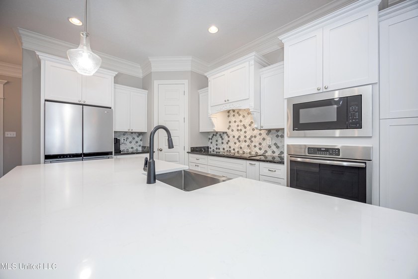 Welcome to 104 Westwind Court in the heart of Ocean Springs! - photo 14