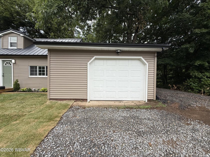Completely remodeled and move-in ready! This beautifully updated - photo 10