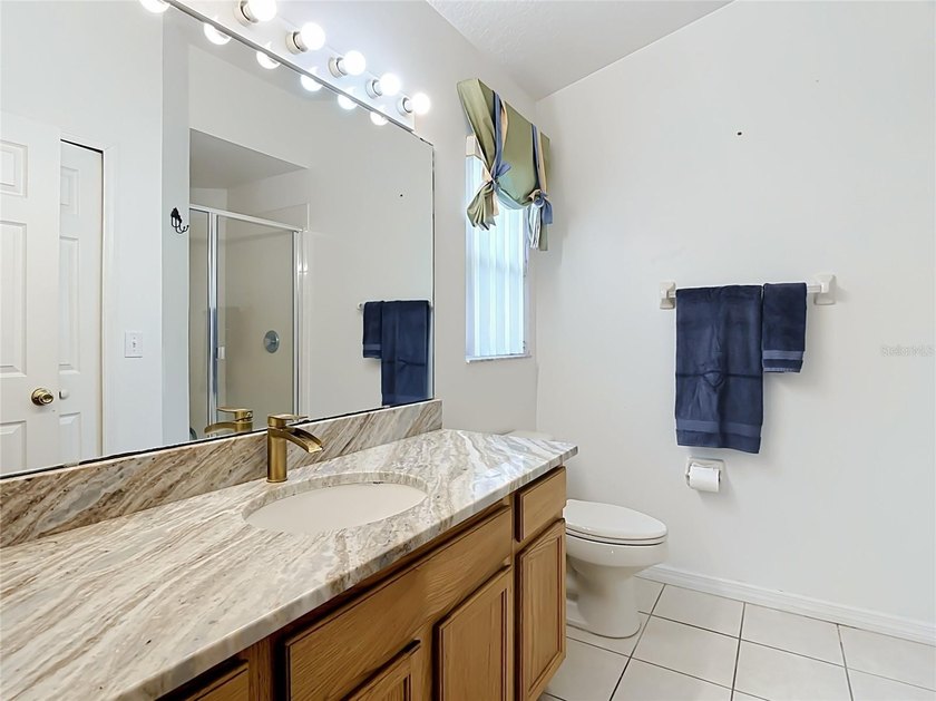 Welcome to this beautiful LAKEVIEW POOL HOME with 4 bed/3 bath - photo 13