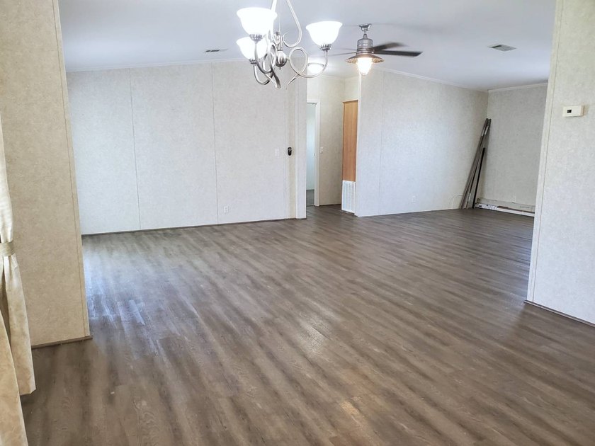 THIS HOME IS ON LEASED LAND WITH A MONTHLY LOT RENT OF $542 AND - photo 20
