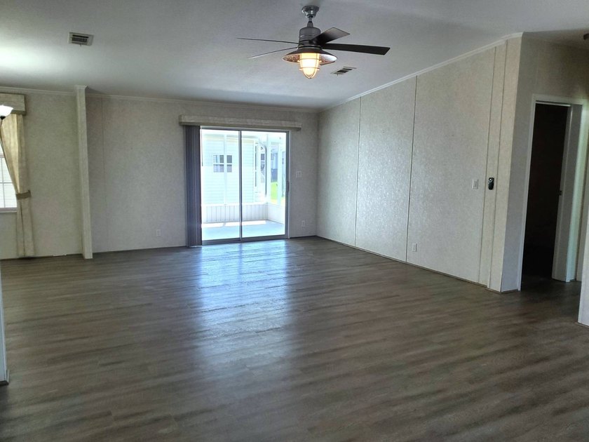 THIS HOME IS ON LEASED LAND WITH A MONTHLY LOT RENT OF $542 AND - photo 22