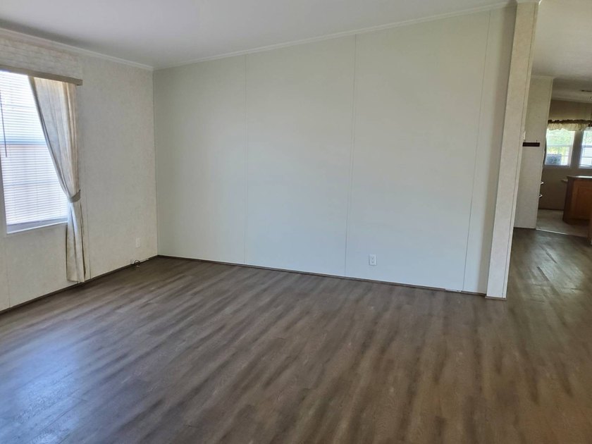 THIS HOME IS ON LEASED LAND WITH A MONTHLY LOT RENT OF $542 AND - photo 23