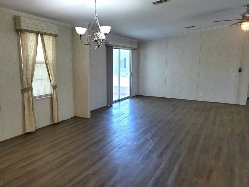 THIS HOME IS ON LEASED LAND WITH A MONTHLY LOT RENT OF $542 AND - photo 27