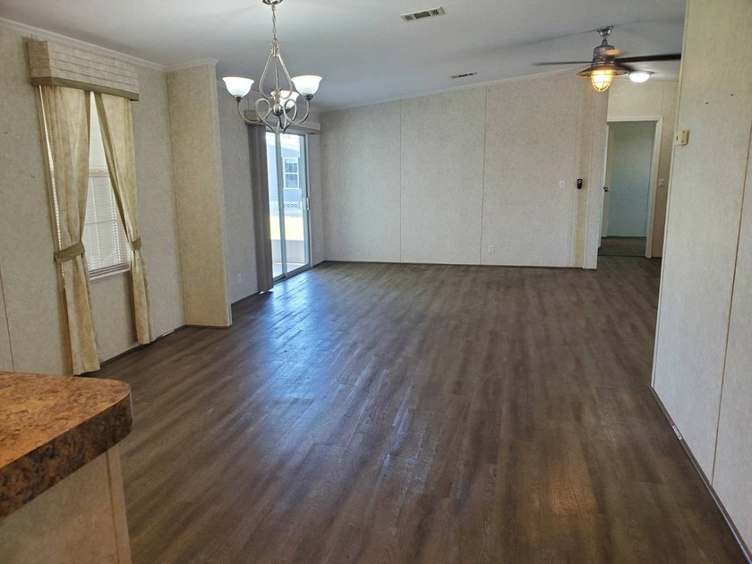 THIS HOME IS ON LEASED LAND WITH A MONTHLY LOT RENT OF $542 AND - photo 28