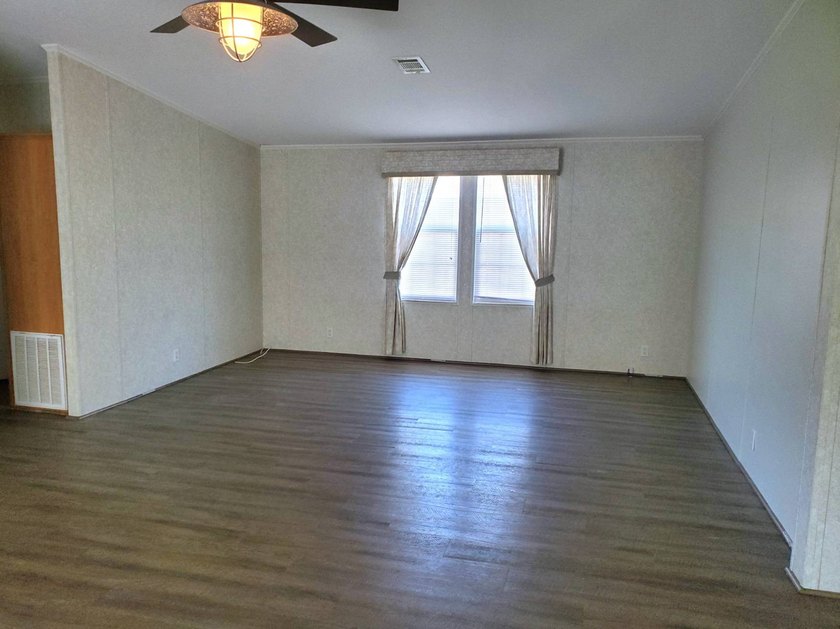 THIS HOME IS ON LEASED LAND WITH A MONTHLY LOT RENT OF $542 AND - photo 29