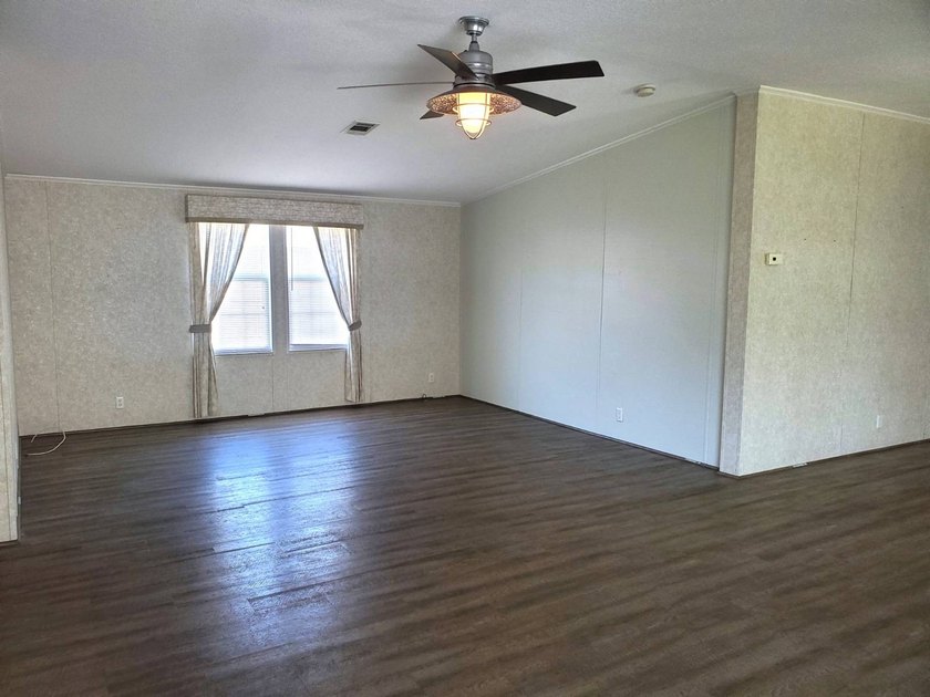THIS HOME IS ON LEASED LAND WITH A MONTHLY LOT RENT OF $542 AND - photo 32