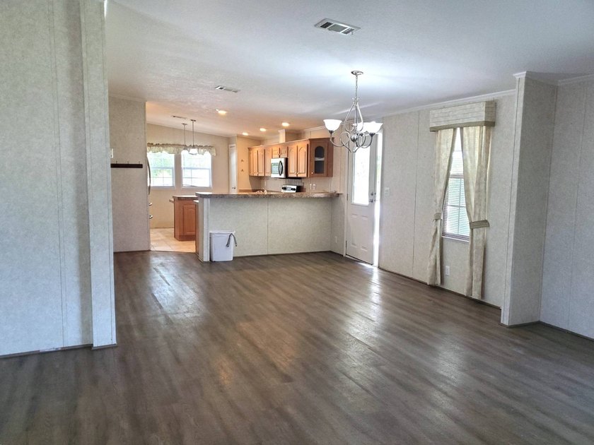 THIS HOME IS ON LEASED LAND WITH A MONTHLY LOT RENT OF $542 AND - photo 36