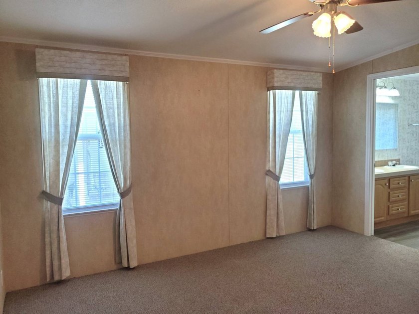 THIS HOME IS ON LEASED LAND WITH A MONTHLY LOT RENT OF $542 AND - photo 42