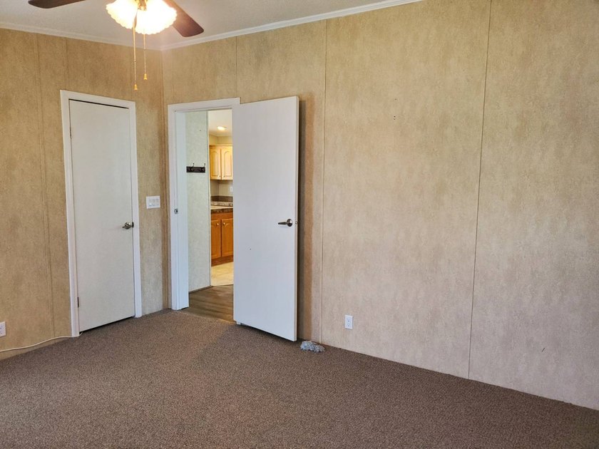 THIS HOME IS ON LEASED LAND WITH A MONTHLY LOT RENT OF $542 AND - photo 44
