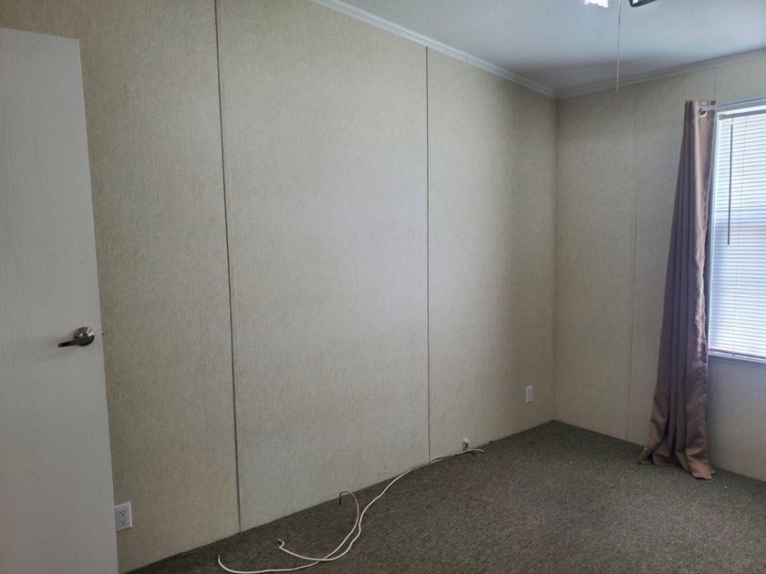 THIS HOME IS ON LEASED LAND WITH A MONTHLY LOT RENT OF $542 AND - photo 56
