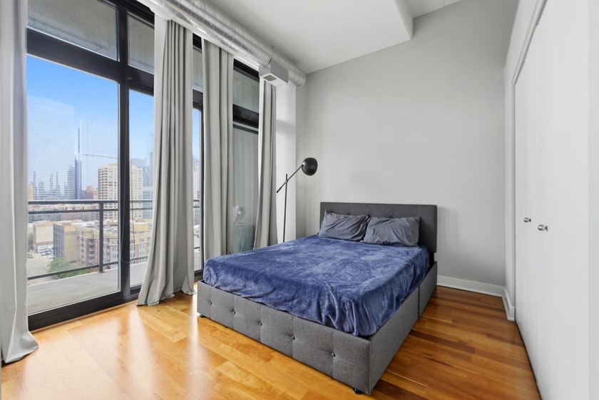 Experience elevated city living in this well-maintained - photo 7